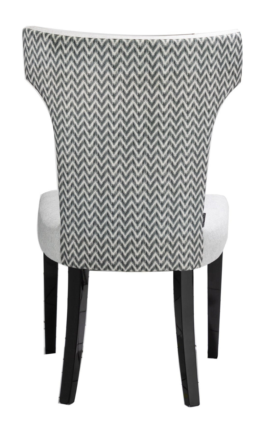 wing-back dining chair with black egs and luxury grey fabric