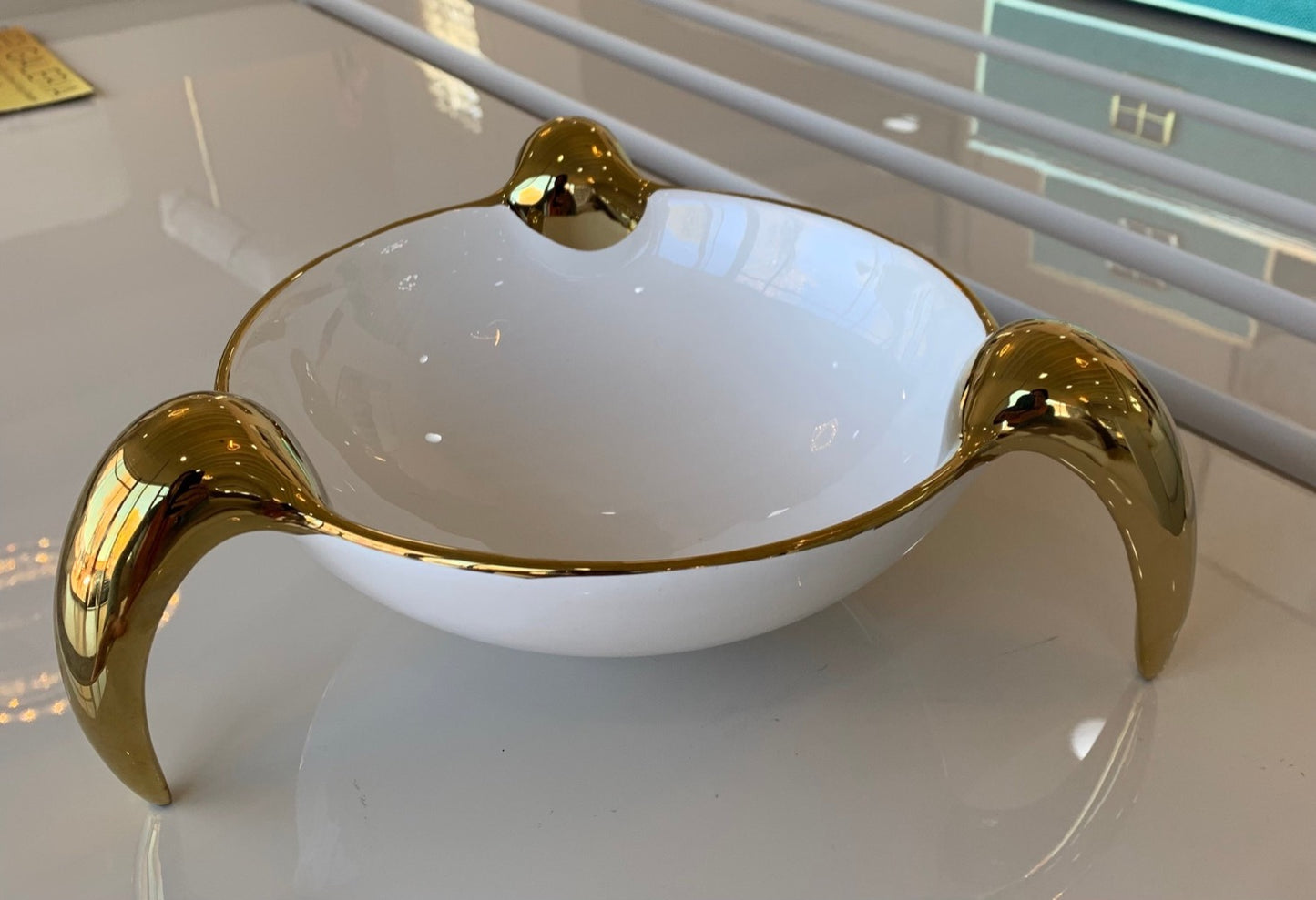 White and gold ceramic decor dish