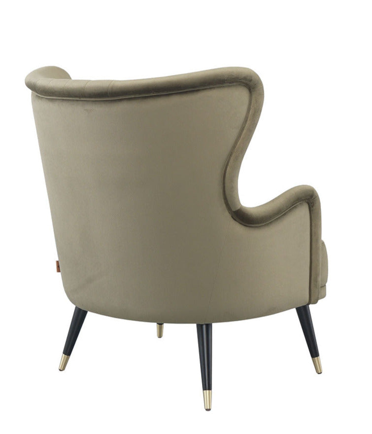 upholstered fabric armchair with gold tipped wooden legs