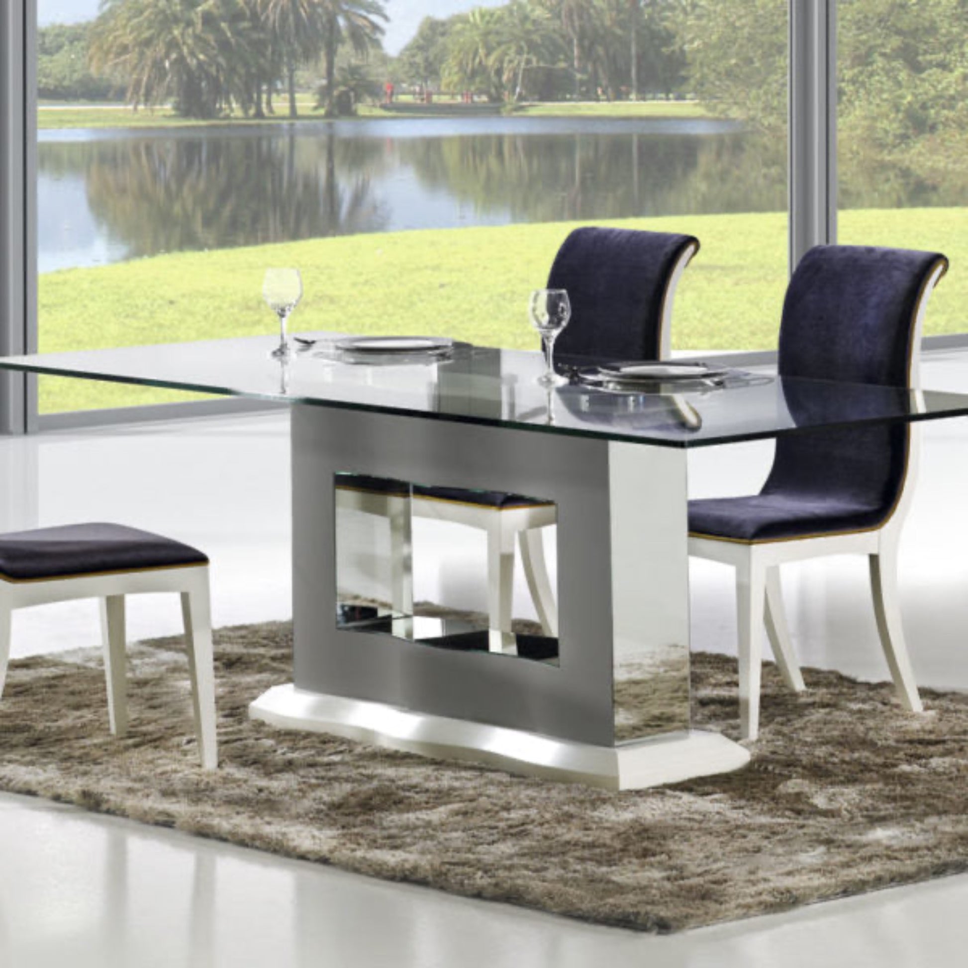 Viena glass dining table with luxury curved Viena dining chairs.